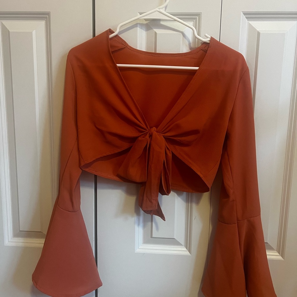 Terracotta/Salmon colored cropped top - adjustable front ties with bell sleeves